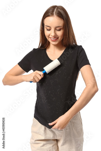 Young woman cleaning her t-...