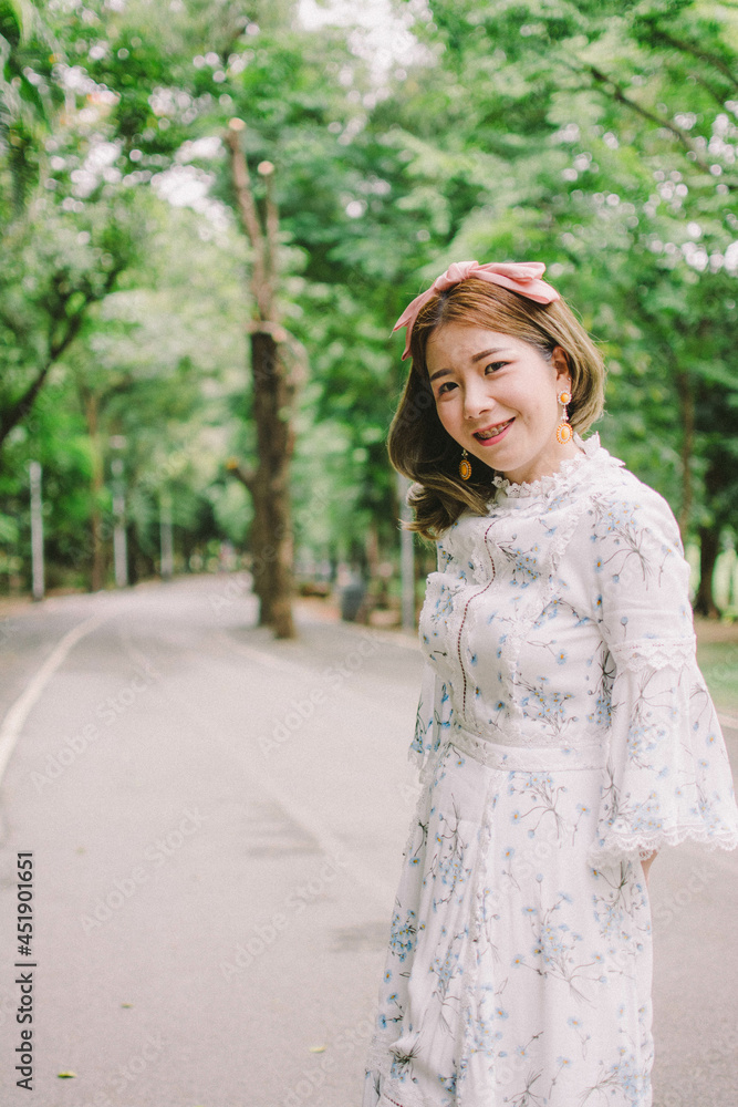 Portrait of a woman decorated in a film style.