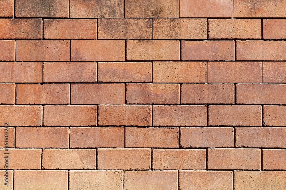 Obraz premium Old brown stone brick wall texture for background