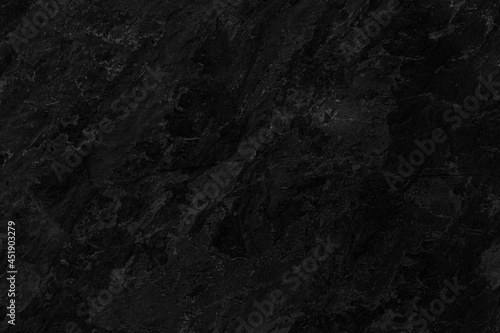 Dark grey black slate background or texture. Black granite slabs background. © torsakarin