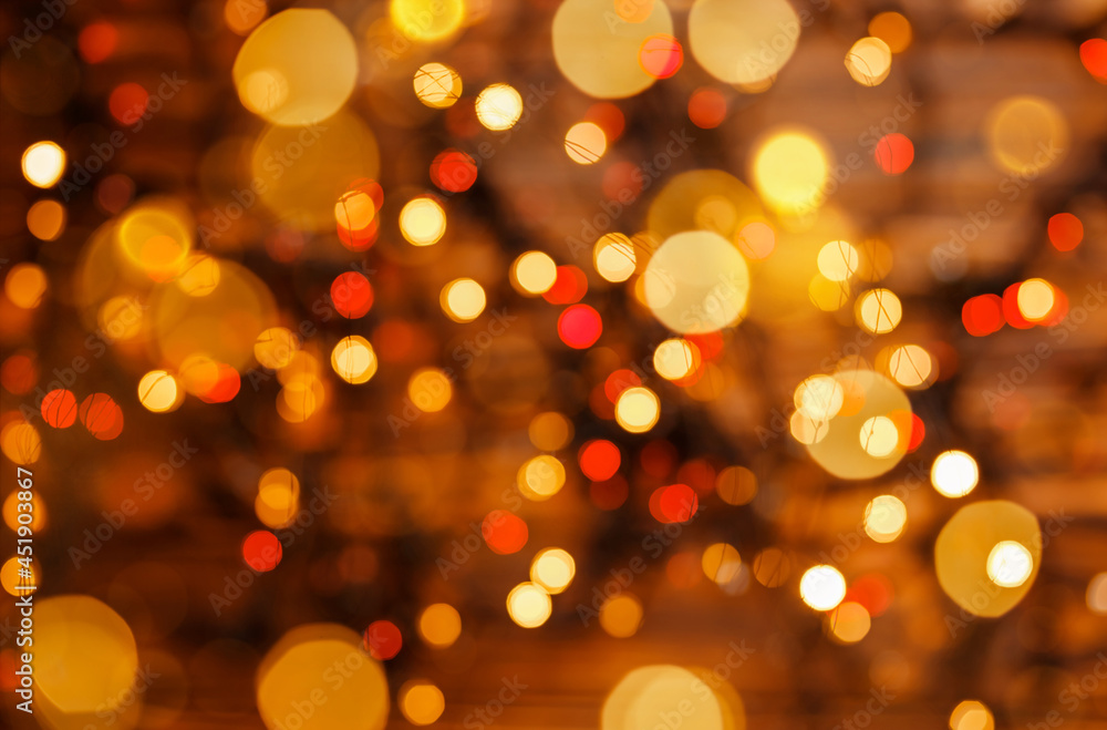 Christmas and New Year holidays background. Festive bokeh background. Abstraction and background. Defocus effect. Blurred bokeh light background. Bokeh from the lights of a garland. Festive mood. Christmas and New Year holidays background. Festive bokeh background. Abstraction and background. Defocus effect. Blurred bokeh light background. Bokeh from the lights of a garland. Festive mood.