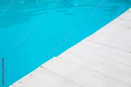 Edge of swimming pool at sea resort, closeup © Pixel-Shot