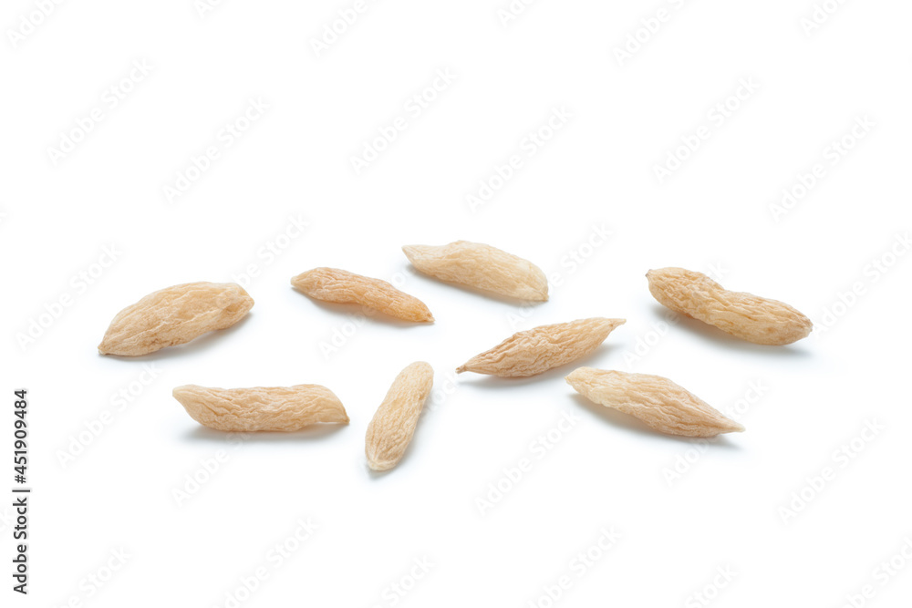 Obraz premium Close-up of ophiopogon ​japonicus (maidong) isolated on white background. Chinese herbal medicine.