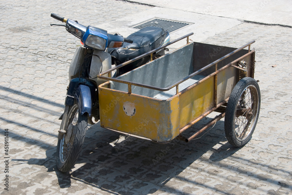 Photo Art Print Typical asian sidecar moped parked Alex Reitter Wirestock