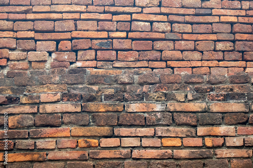 Antique old brick wall background and texture in Thailand