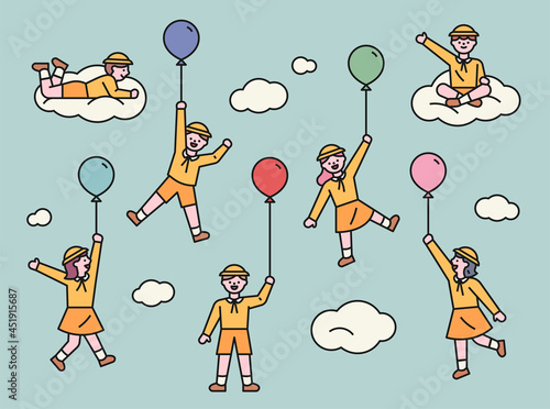Kindergarten children are holding balloons and flying in the sky. vector design illustrations.