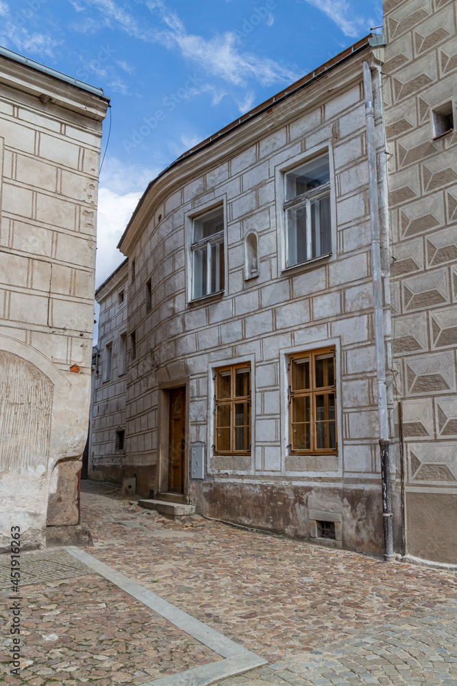 Street corner with old houses with sgraffito facades, a special carving technique in slavonice in the czech republic