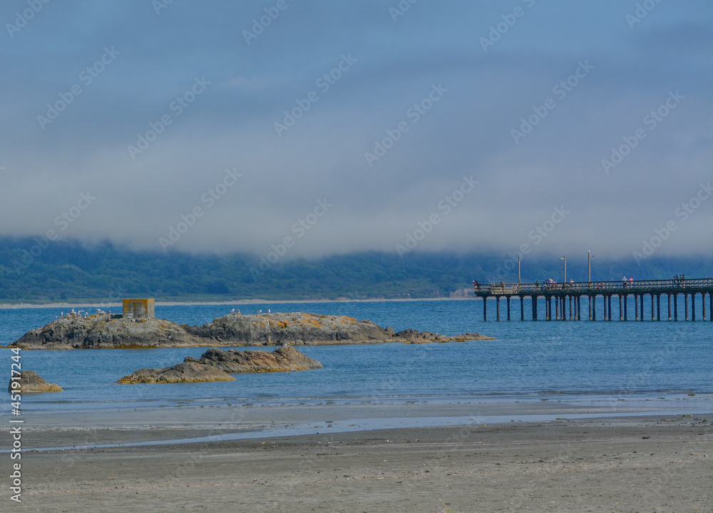 Gorgeous view from Battery Point Beach of the B Street Pier in Crescent City, Del Norte County, California 