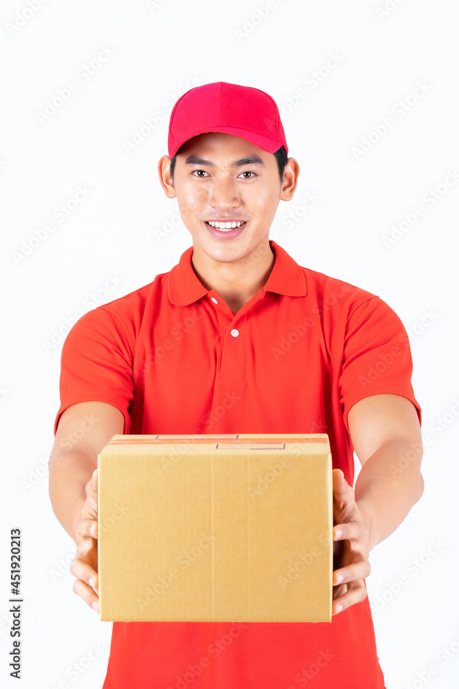 Delivery man employee in red cap blank t-shirt holding a parcel box And he used hand to give a thumbs up like icon isolate on white background ,showing company excellence , transporting goods employee Delivery man employee in red cap blank t-shirt holding a parcel box And he used hand to give a thumbs up like icon isolate on white background ,showing company excellence , transporting goods employee