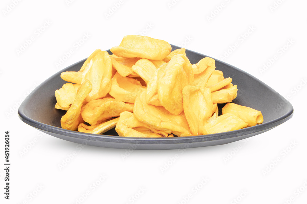 Dried jackfruit. Close up of a pile of dried jackfruit on a black plate for a snack chips. Food preservation concept popular in Thailand. Suitable for party. isolated on white background. Dried jackfruit. Close up of a pile of dried jackfruit on a black plate for a snack chips. Food preservation concept popular in Thailand. Suitable for party. isolated on white background.