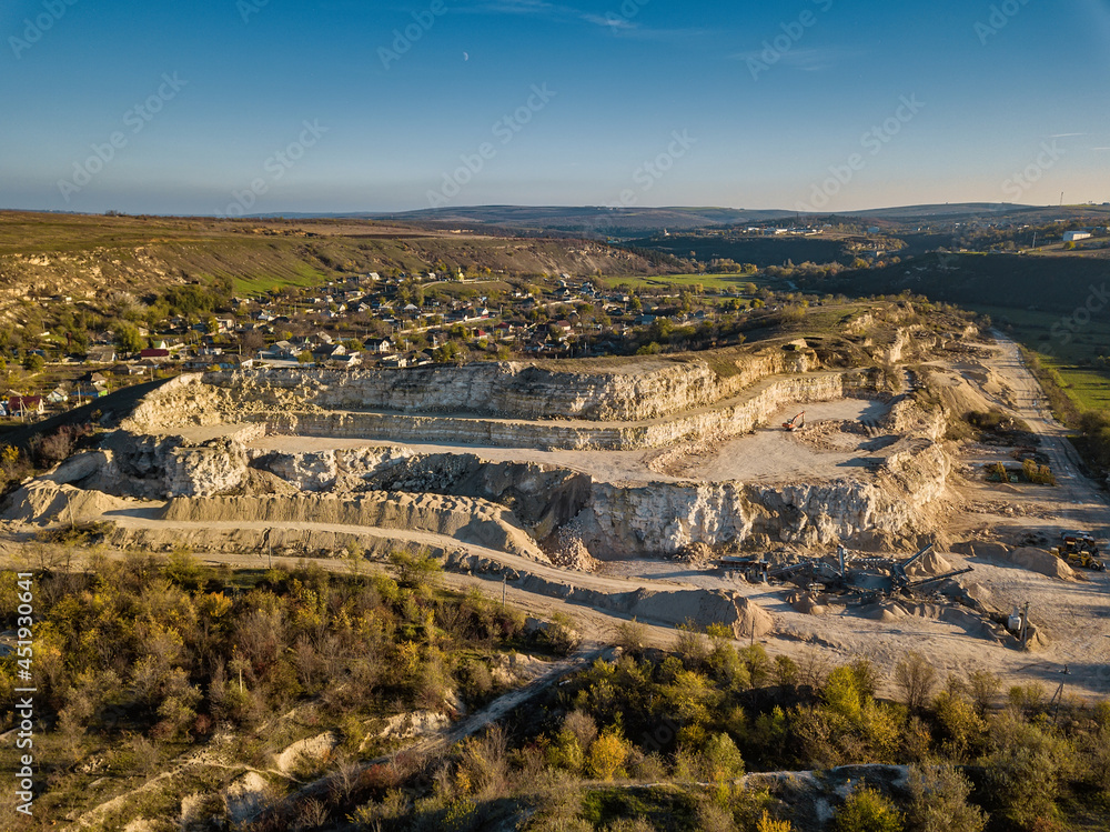 Stone Quarry Aerial. Heavy machinery working at stone qaurry.