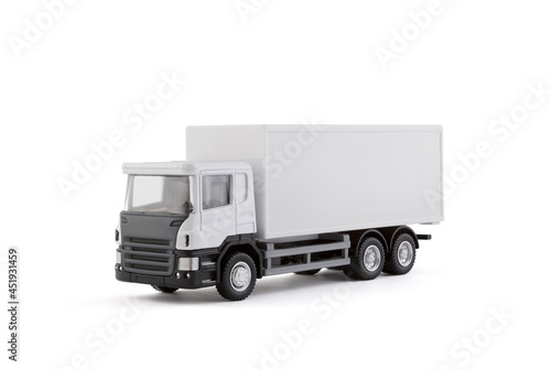 White cargo delivery truck miniature isolated on white background with clipping path © Jakub Krechowicz