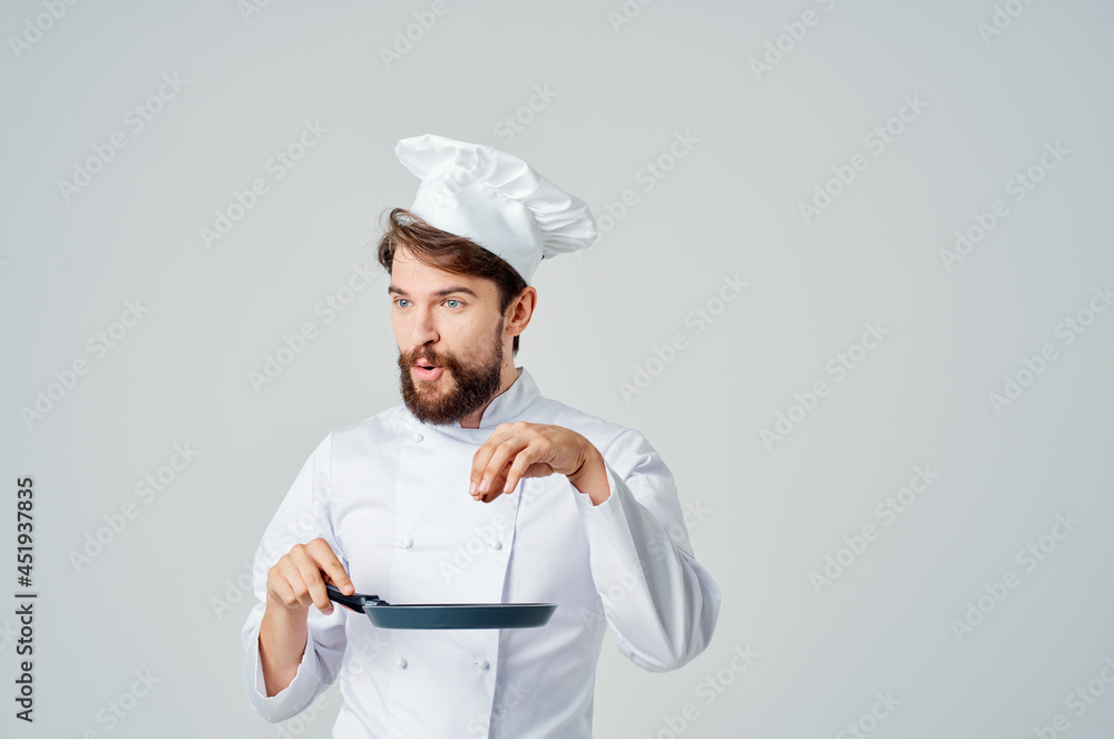 a man in a chef's uniform restaurant provision of services Professional a man in a chef's uniform restaurant provision of services Professional