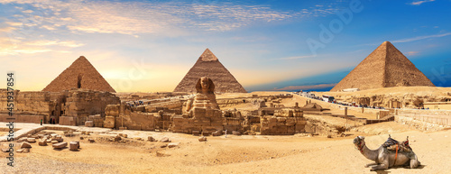 Obraz na płótnie Giza Pyramids and Sphinx panorama with a camel lying by, Cairo, Egypt