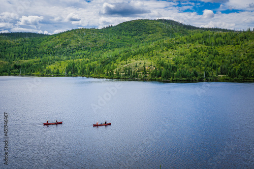 People canoeing on lake Arthabaska in Parc National des Grands Jardins, a national park of Charlevoix, in Quebec province (Canada)