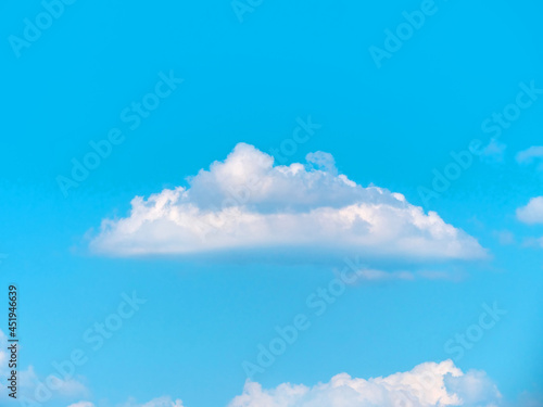 Beautiful bright blue sky with clouds over the sea, nature wallpapers, cloudscape background. Natural backdrop, cloudy surface, sunny weather.
