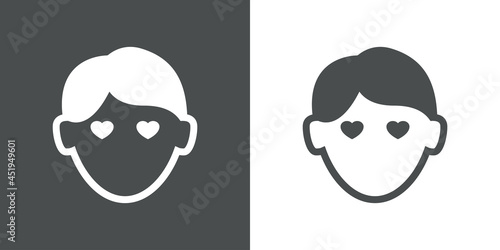 Hombre enamorado. Logotipo con silueta de cara de chico con ojos con forma de corazón en fondo gris y fondo blanco