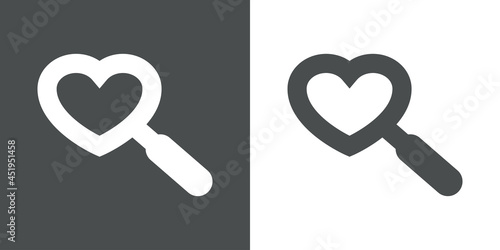 Buscar el amor. Logotipo con corazón con forma de lupa en fondo gris y fondo blanco