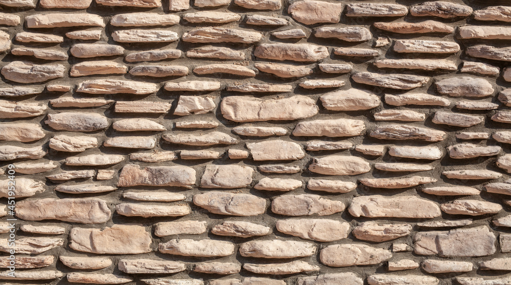 Obraz premium Stone wall texture background. Concrete wall with rocks. Rock wall of a castle.
