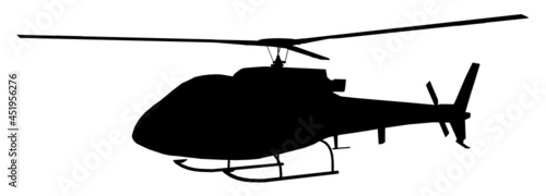 Silhouette mit einem Helikopter photo