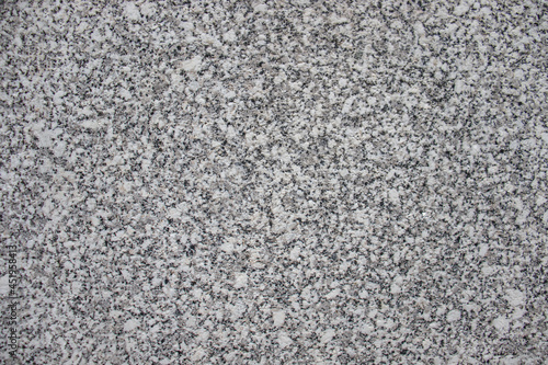 Construction crushed stone. Crushed stone on the beach on a sunny day close-up.