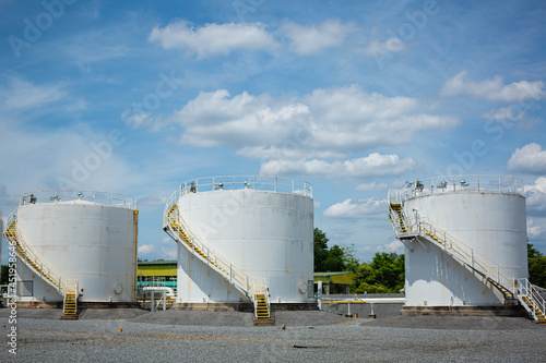 The row of small white tanks for petrol station and refinery