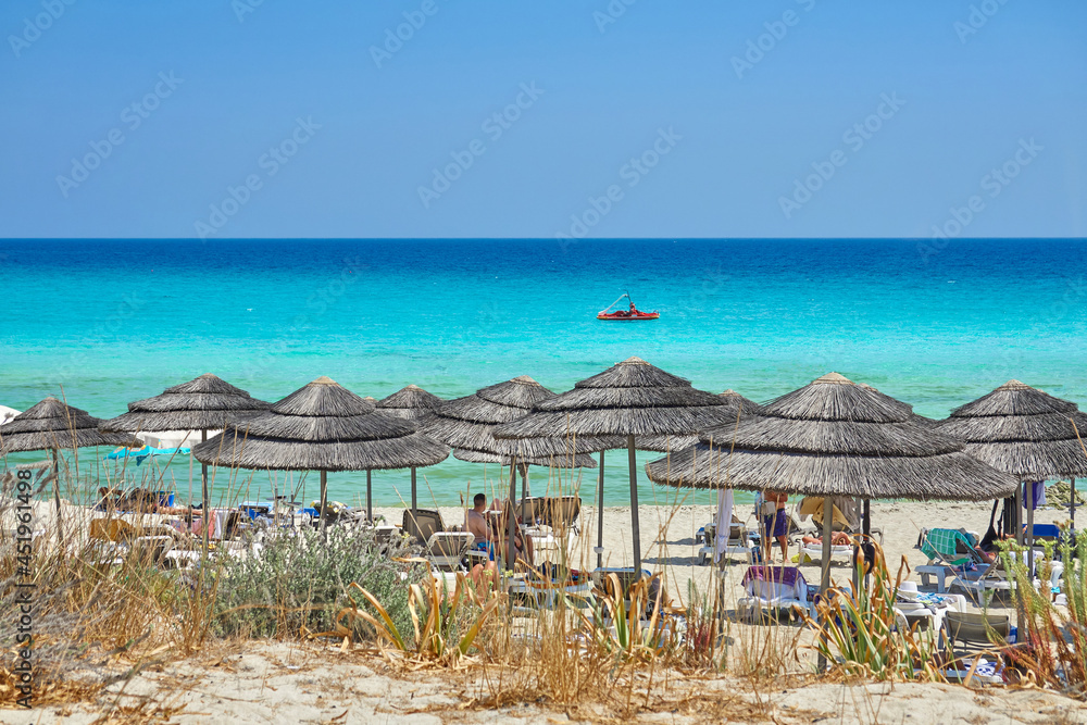 Beach, Cyprus, Aya Napa. Sea, shore, sunbeds and Umbrellas.