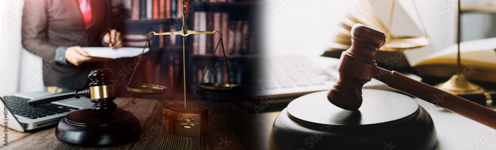 justice and law concept.Male judge in a courtroom on wooden table and Counselor or Male lawyer working in office. Legal law, advice and justice concept. justice and law concept.Male judge in a courtroom on wooden table and Counselor or Male lawyer working in office. Legal law, advice and justice concept.