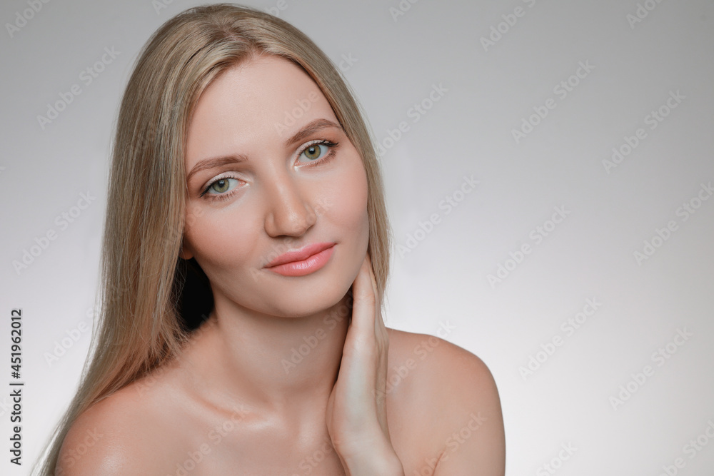 Portrait of young woman with beautiful face on light grey background. Space for text Portrait of young woman with beautiful face on light grey background. Space for text