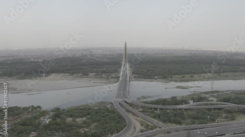 An aerial shot of the Signature Bridge with cars moving in New Delhi, India
 photo