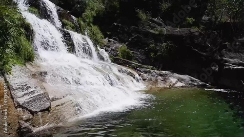 Fecha de Barjas waterfall (also known as Tahiti waterfall) in the mountains of Peneda-Geres National Park, Portugal photo