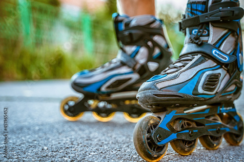 Roller skates ride on the asphalt. Active life.