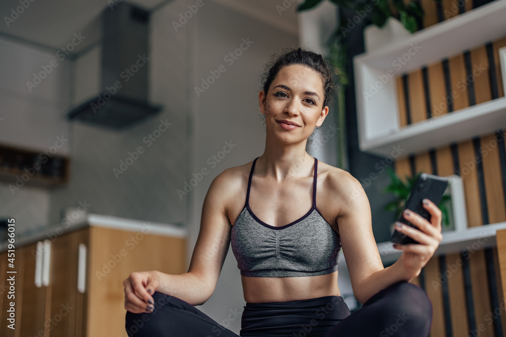 Young woman, posing for the camera, at home. Young woman, posing for the camera, at home.