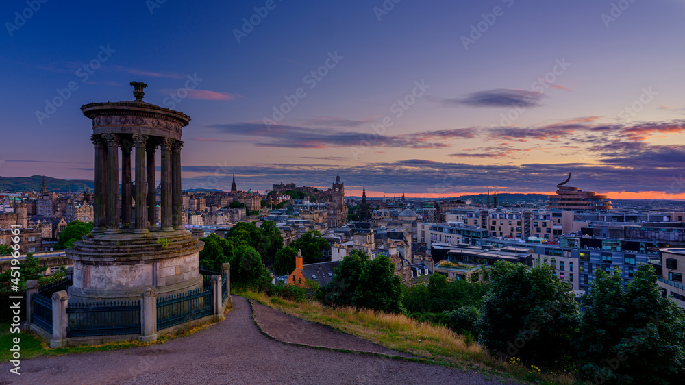Summer evening and twilight view over the city of Edinburgh from Calton Hill, Edinburgh, Scotland