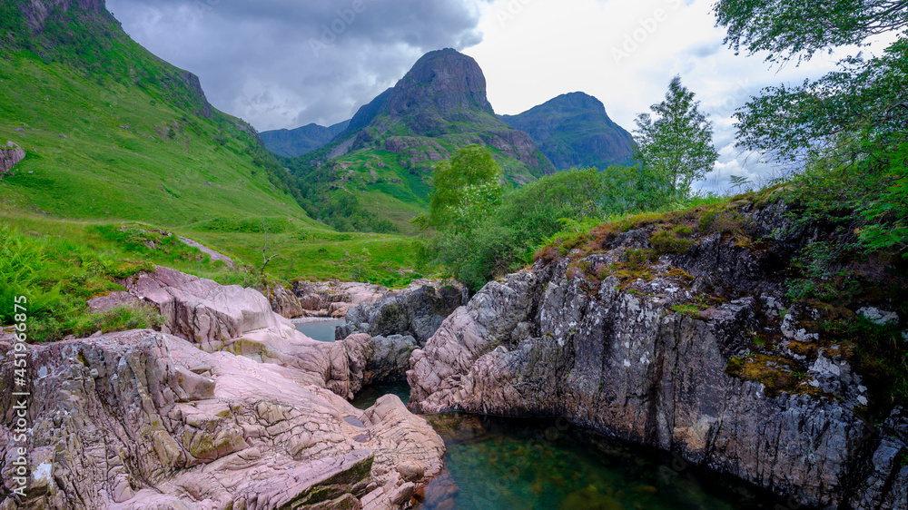 The Three Sisters of Glencoe with the waterfalls near the Study, Scotland The Three Sisters of Glencoe with the waterfalls near the Study, Scotland