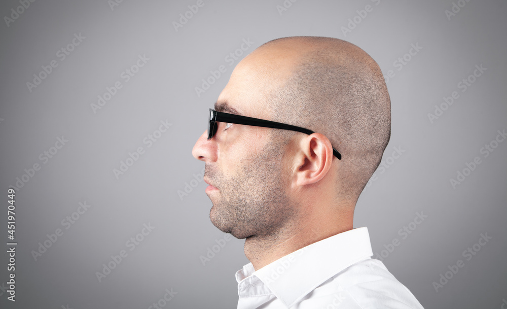 Caucasian young businessman wearing eyeglasses. Caucasian young businessman wearing eyeglasses.