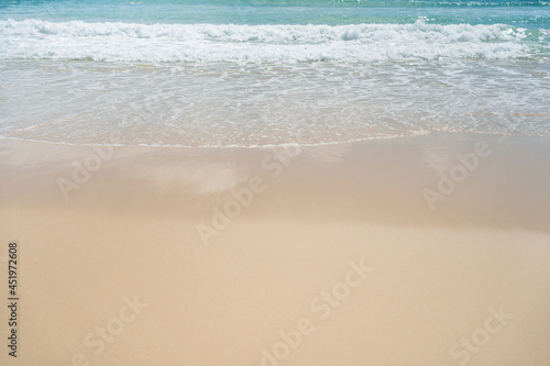 Fantastic colorful sunset on surfing  beach.Beautiful Blue wave and white foamy nature on sunny summer day. © loveyousomuch