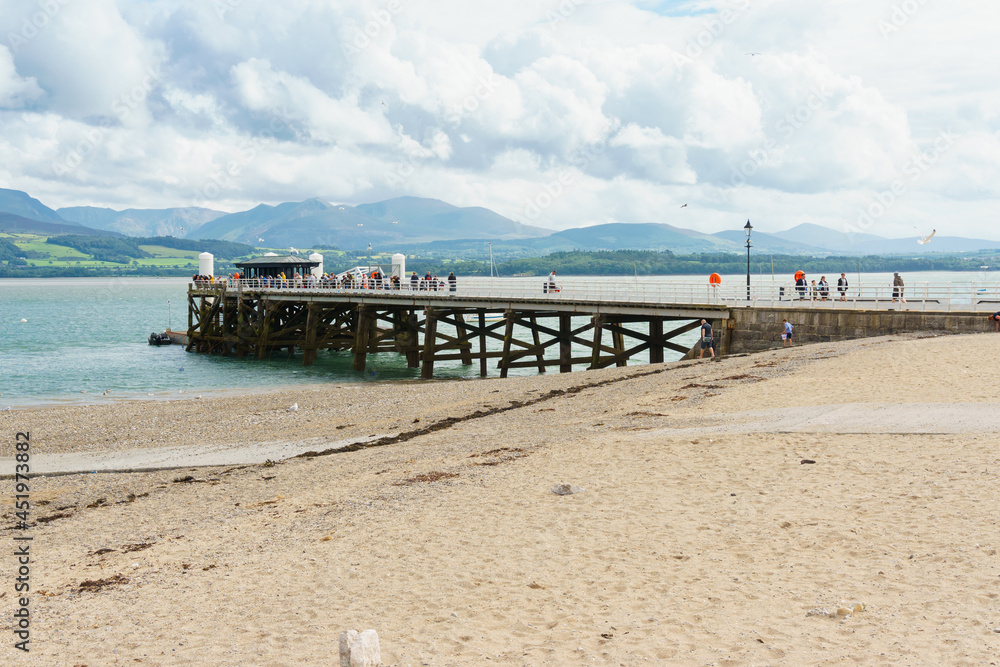 Beaumaris Pier a popular attraction for visitors and tourists to the the town of Beaumaris in Anglesey UK