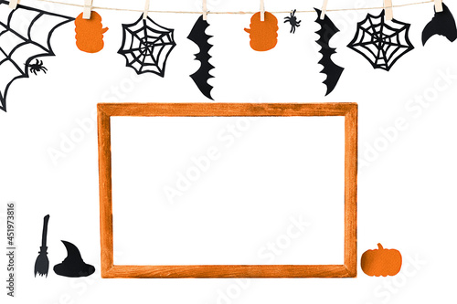 Halloween background with orange frame and assessories around isolated on white	 photo
