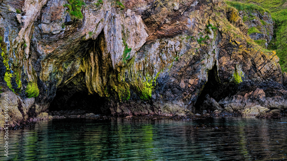 Sea caves, rock formations, and cliffs at Lybster in the Highlands