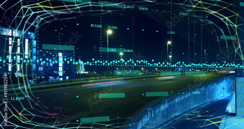 Financial data processing against night city traffic