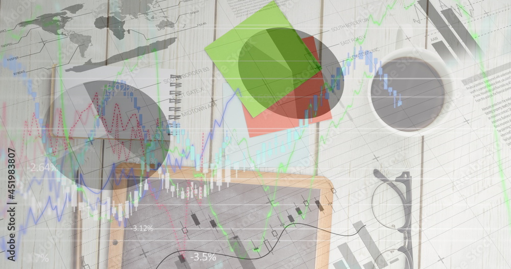 Image of financial data processing over tablet on desk Image of financial data processing over tablet on desk