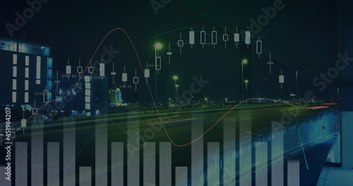Digital image of financial data processing against night city traffic