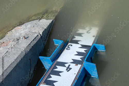 Measurement of water height - a water gauge on the Danube  photo