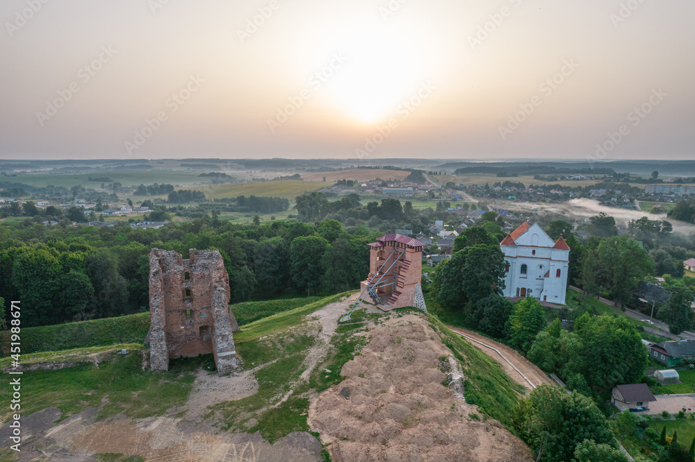 Sunrise over the ruins of the 13th century castle in Novogrudok (Mindovga Castle