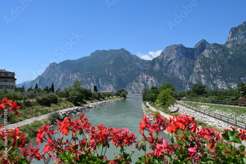 View of the Sarca river where it flows into Lake Garda; Italy; Dolomites