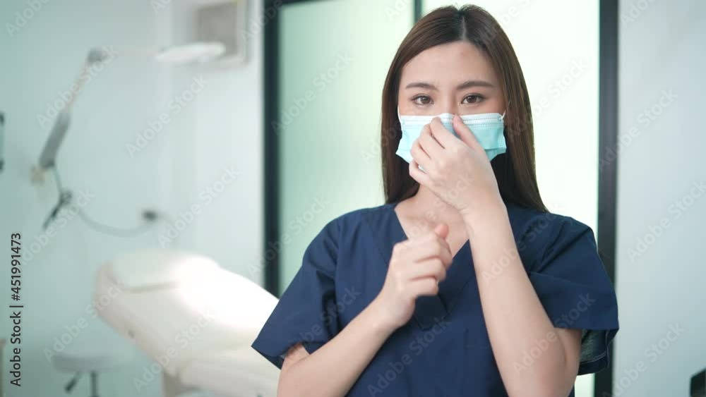 young woman person showing to wearing surgical face mask, protection of coronavirus covid-19 virus disease flu care, medicine health care concept young woman person showing to wearing surgical face mask, protection of coronavirus covid-19 virus disease flu care, medicine health care concept