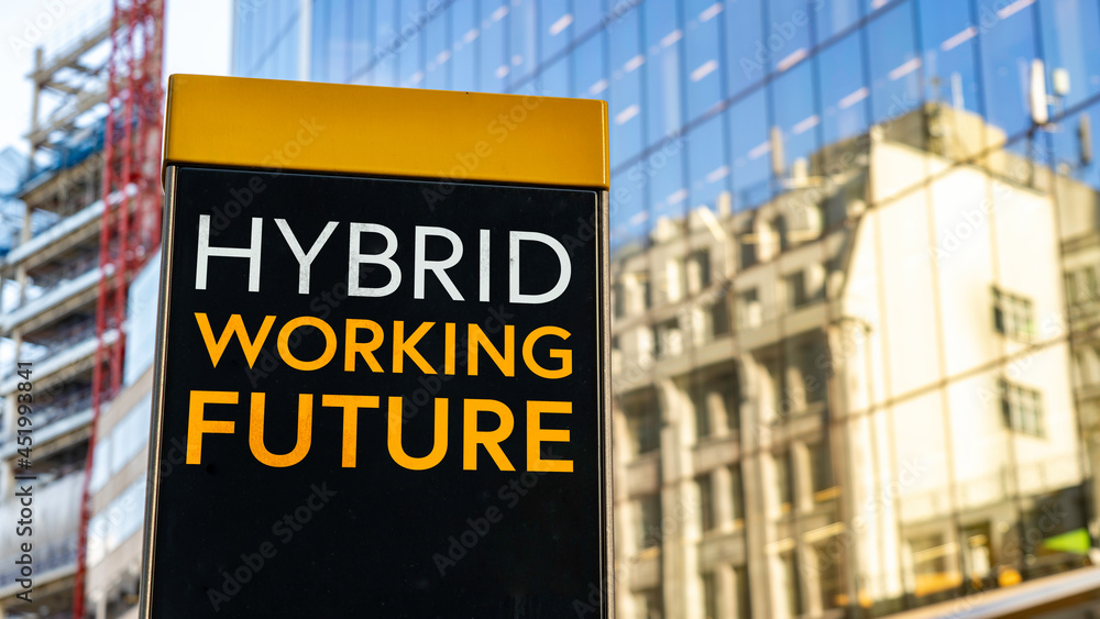 Fototapeta premium Hybrid Working Future Worn Sign in business city setting 