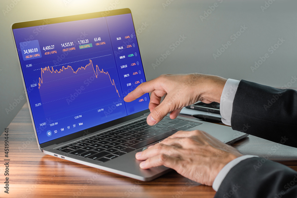 Man using computer trading online, Man investment in stock exchange trade Man using computer trading online, Man investment in stock exchange trade