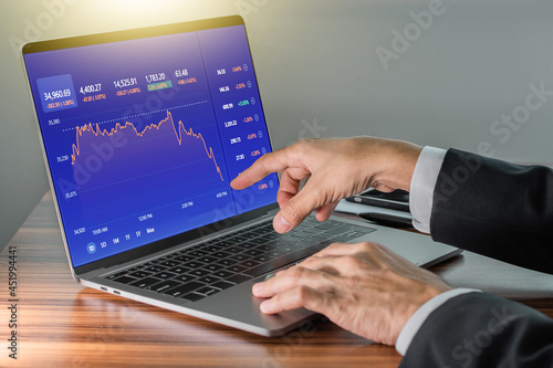 Man using computer trading online, Man investment in stock exchange trade